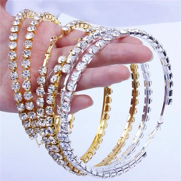 Over sized Diamond Hoops.
